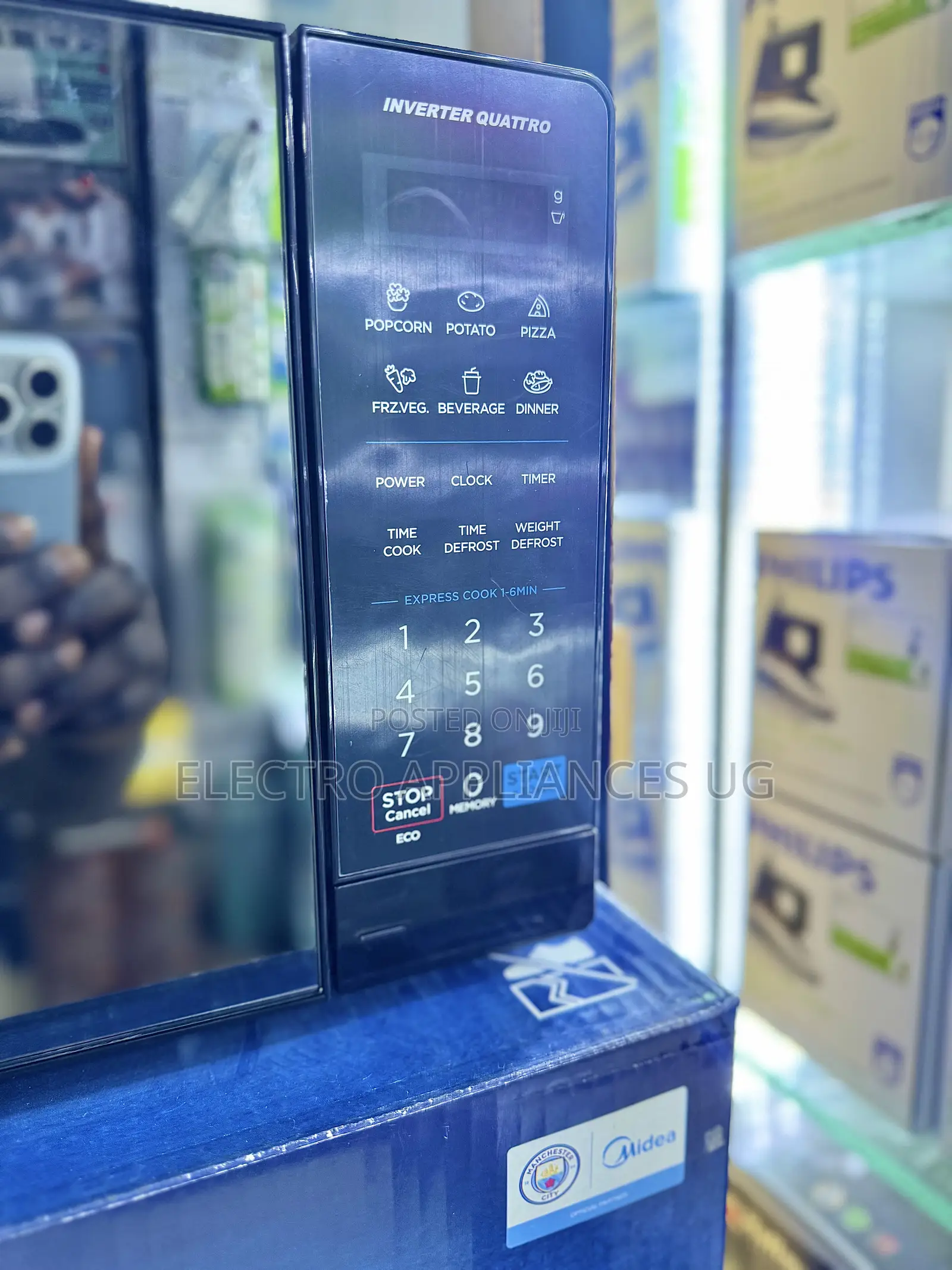 Midea Inverter Quattro Microwave Oven.