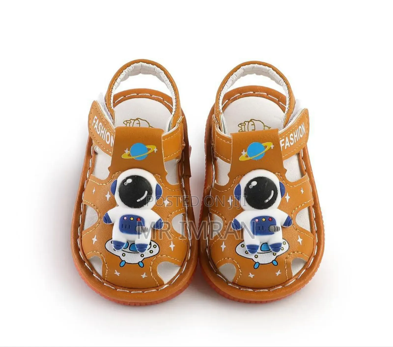 Babypro Brown Infant Squeaky Sandals With an Astronaut Design.