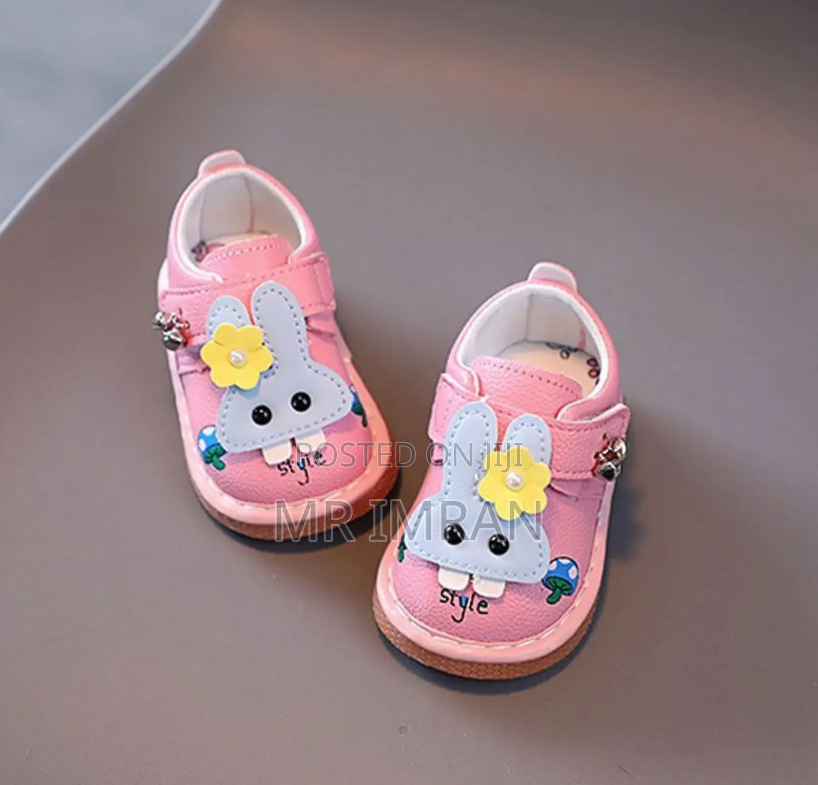 Infant Sandals With Rubber Soles and a Cartoon Rabbit Decoration.