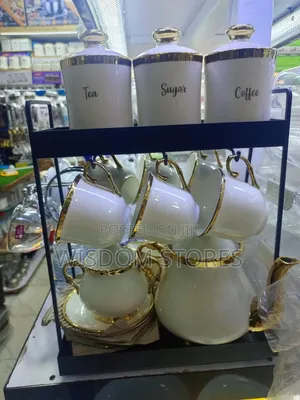 Ceramic Coffee and Tea Set With a Storage Rack.