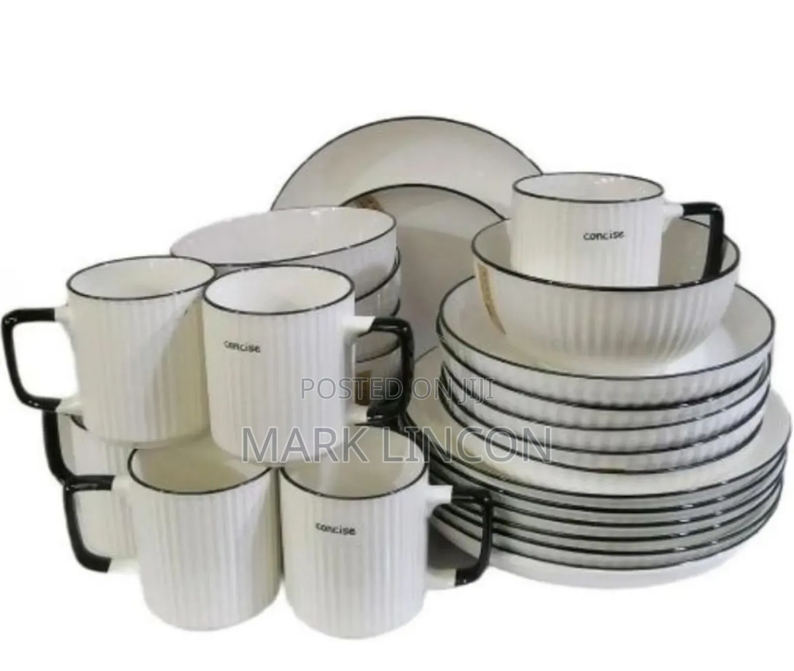 24- Piece Concise Ceramic Dinner Set With a White Finish and Black Rim