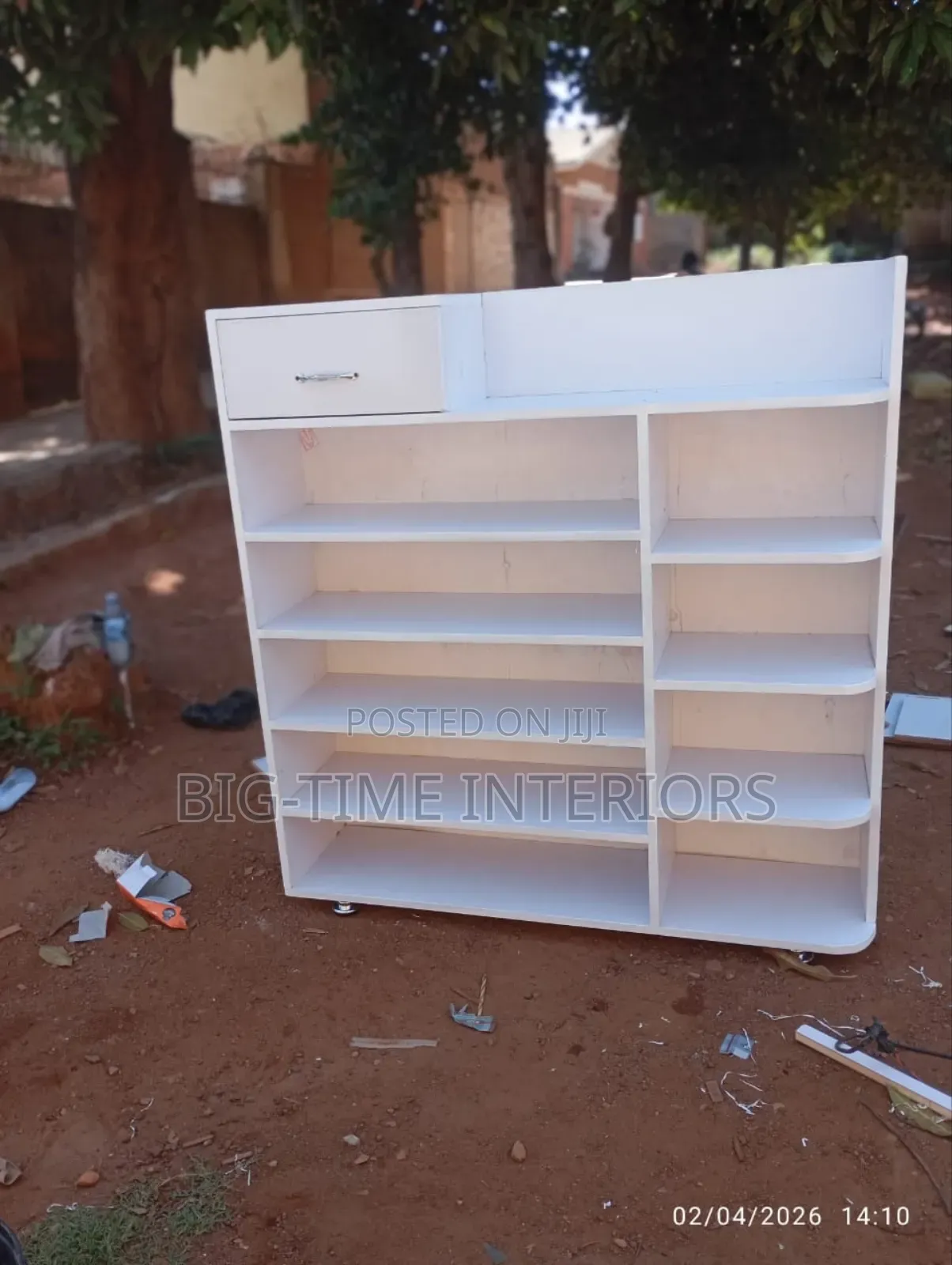 White Open Shoe Rack With a Single Drawer