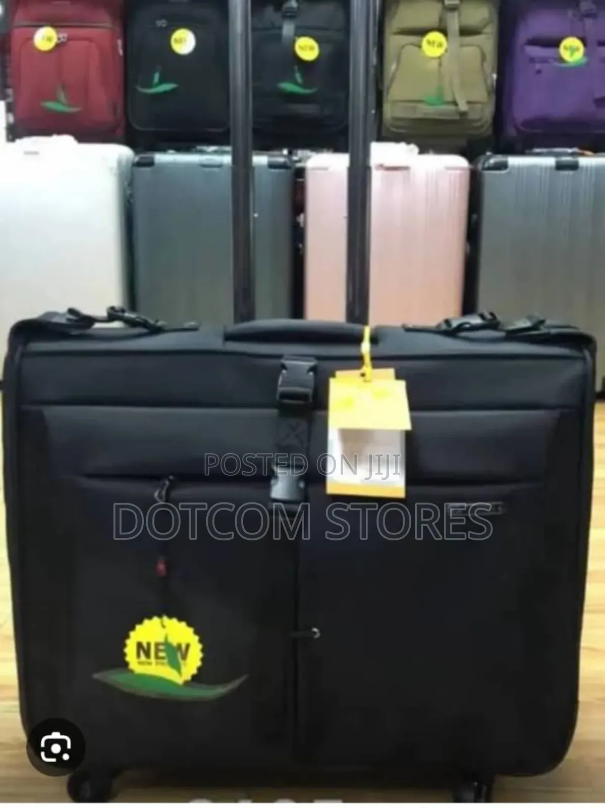 Fabric Carry-on Garment Bag With a Telescopic Handle and Wheels.