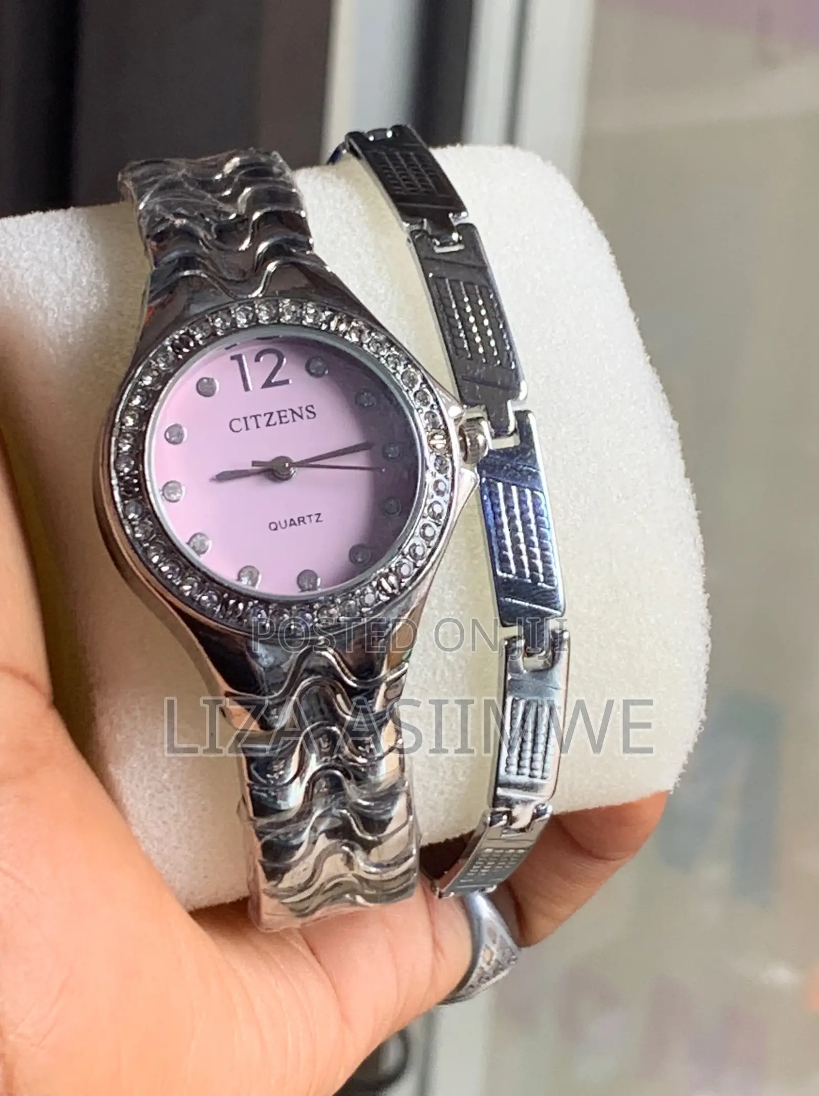 Silver-Tone Women's Citzens Quartz Watch and a Matching Bracelet.