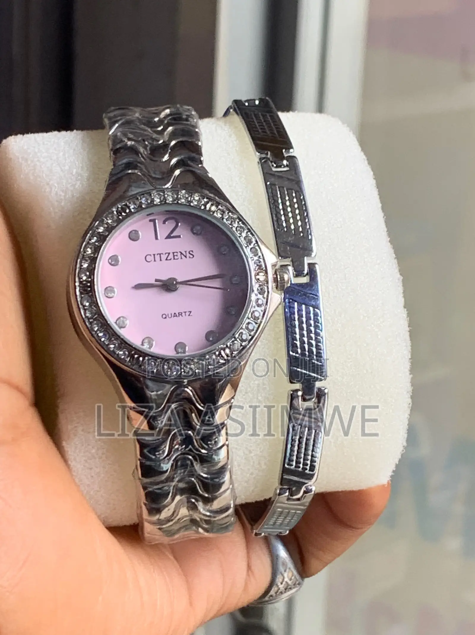 Silver-Tone Women's Citzens Quartz Watch and a Matching Bracelet.