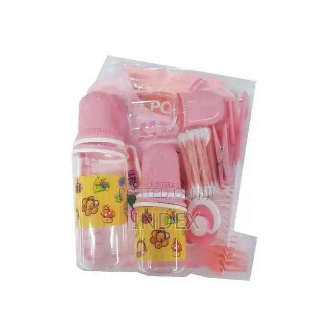 A Set of Three Baby Bottles With Helpers -