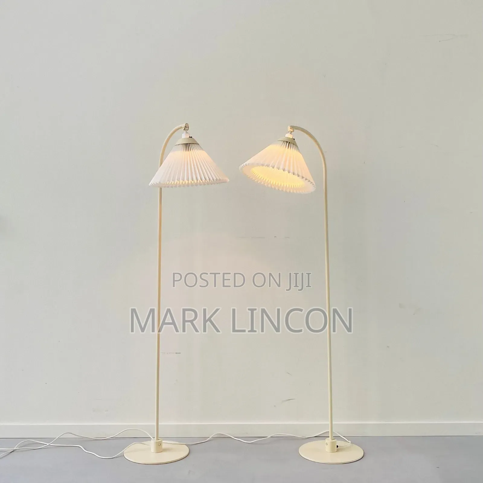 White Floor Lamp With a Pleated Shade
