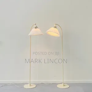 White Floor Lamp With a Pleated Shade