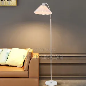 White Floor Lamp With a Pleated Shade
