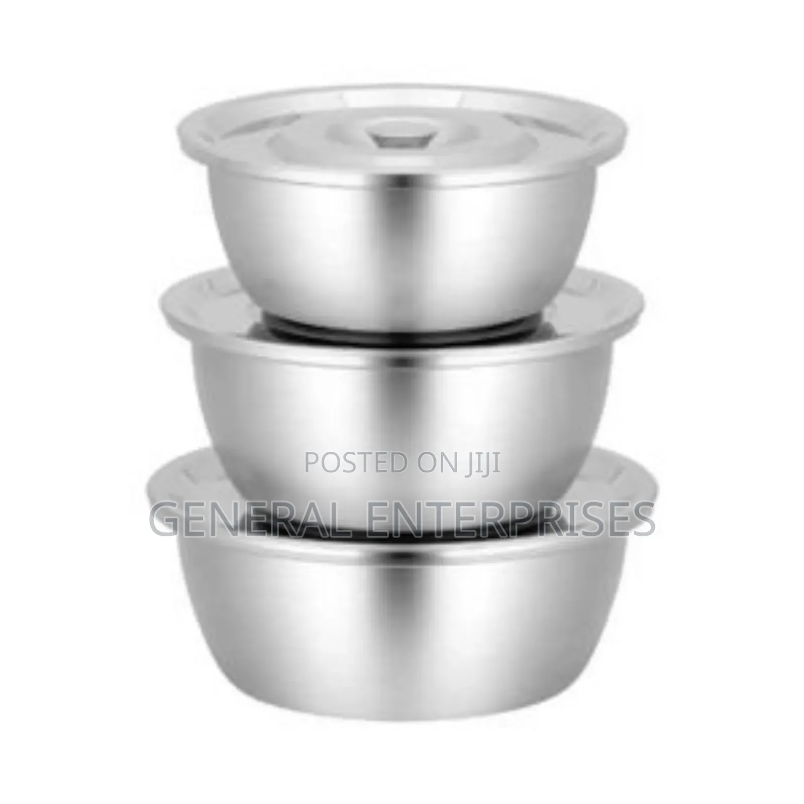 Set of Nesting Stainless Steel Mixing Bowls With Lids.
