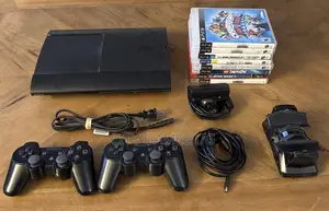 Sony Playstation 3 Ps3 Super Slim Console 2 Controllers 15 Games