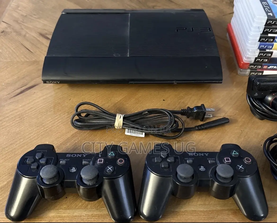 Sony Playstation 3 Ps3 Super Slim Console 2 Controllers 15 Games