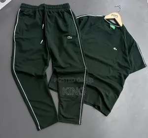 Lacoste Tracksuit Black Track Pants With White Piping Details.