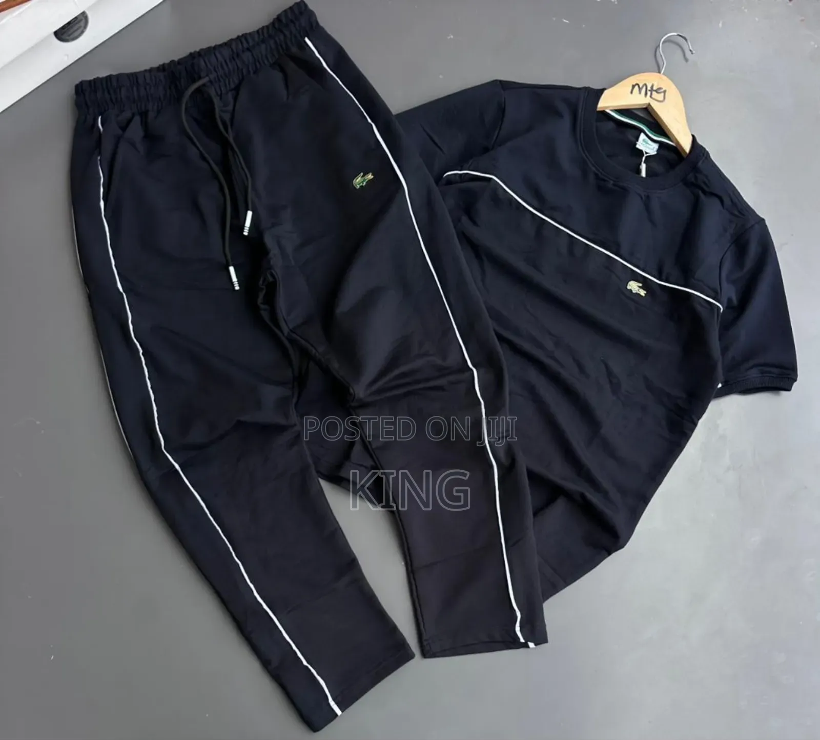 Lacoste Tracksuit Black Track Pants With White Piping Details.