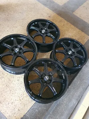 Size 18 Subaru In Original Black Color It Has Sam Small Offset In It.