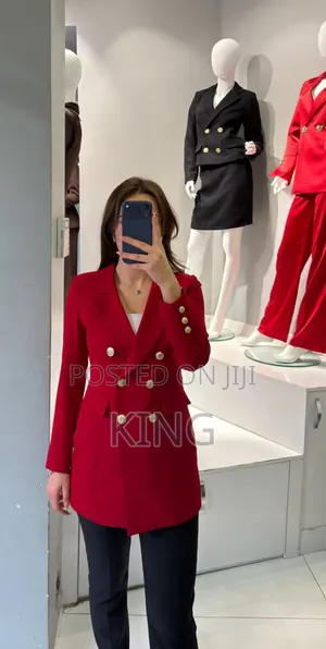 Women's Double-Breasted Blazer With Gold-Toned Buttons.