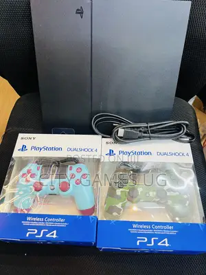 Sony Playstation 4 Black Console With Controllers and Cables