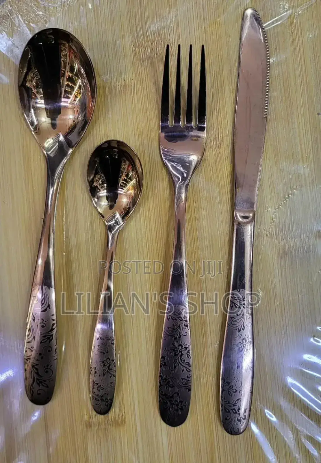 24-Piece Set of Stainless Steel Flatware With an Engraved Floral