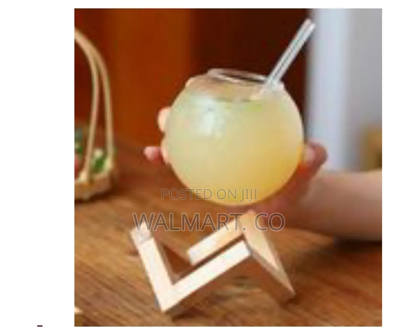 Modern Spherical Glass Beverage Vessel With Geometric Wooden Stand