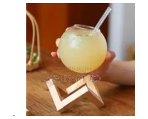 Modern Spherical Glass Beverage Vessel With Geometric Wooden Stand
