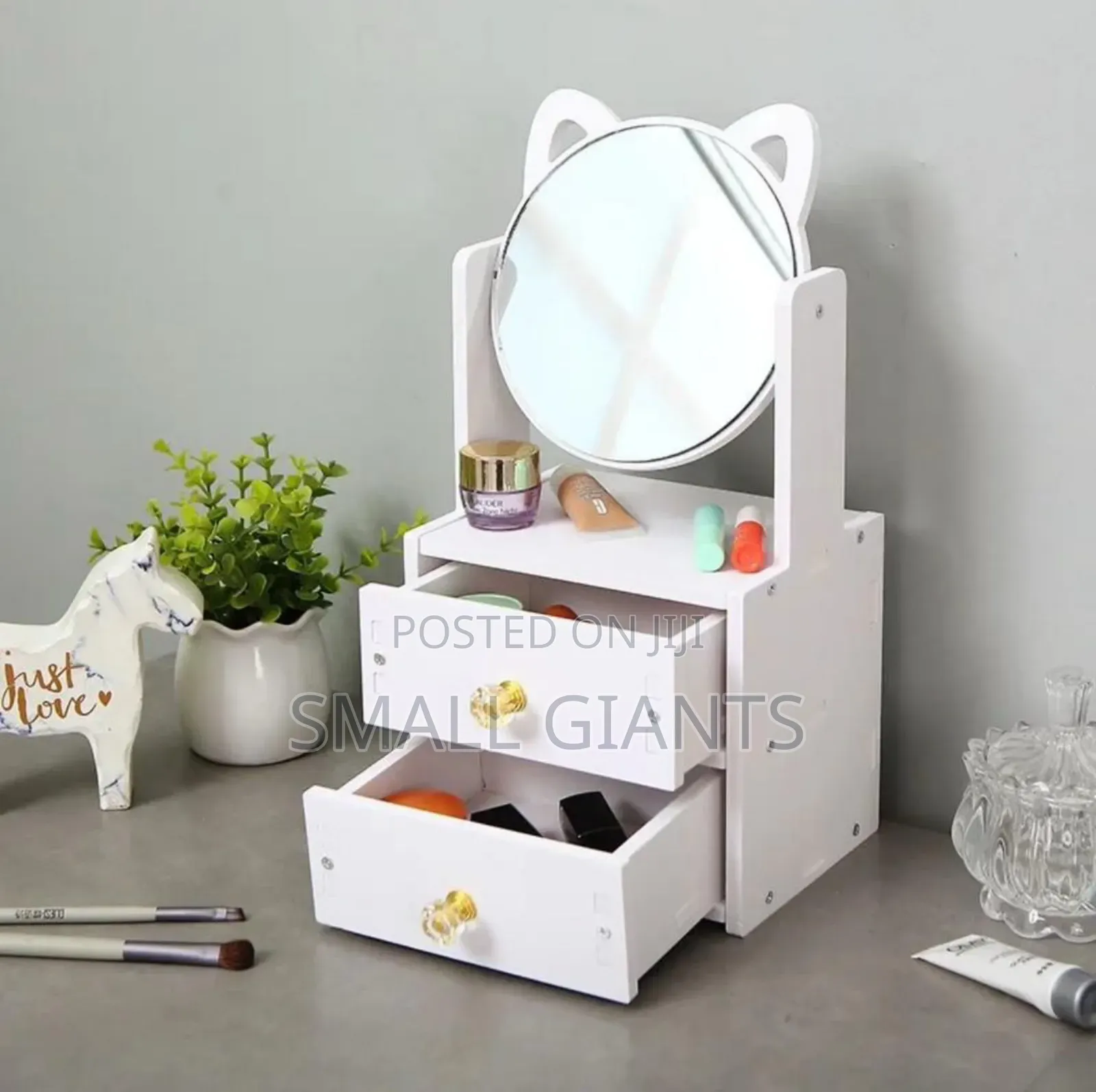 Cosmetic Organizer With a Rotating Mirror and Two Drawers.