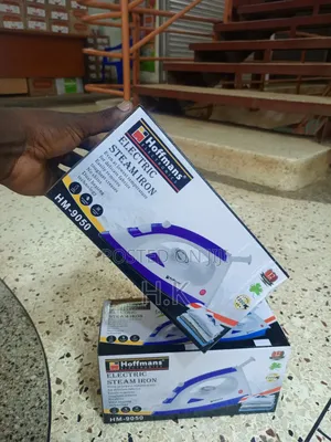Hoffmans Electric Steam Iron, Model Number Hm-9050.