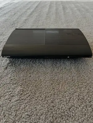 Fairly New Playstation 3 Superslim. 15 Games and 2 Controllers. Nice