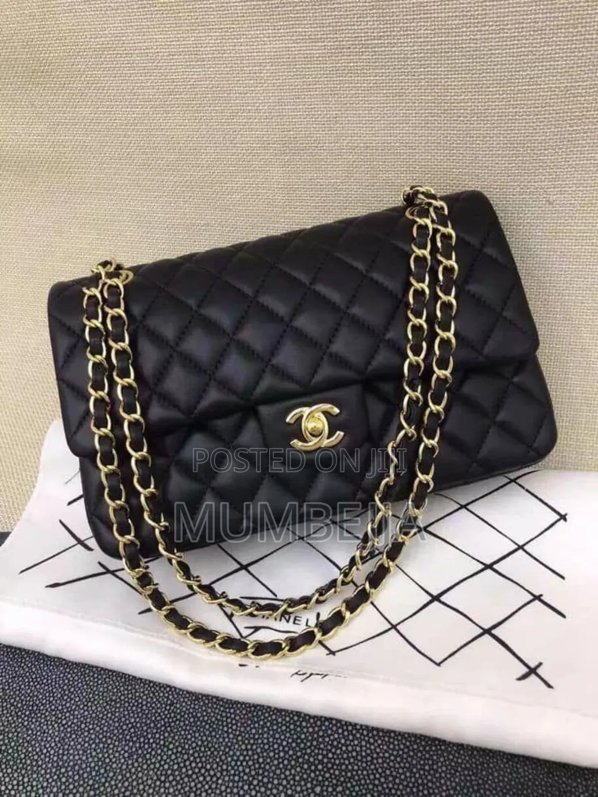 Black Original Chanel Cross Bag.