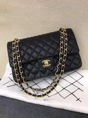 Black Original Chanel Cross Bag.