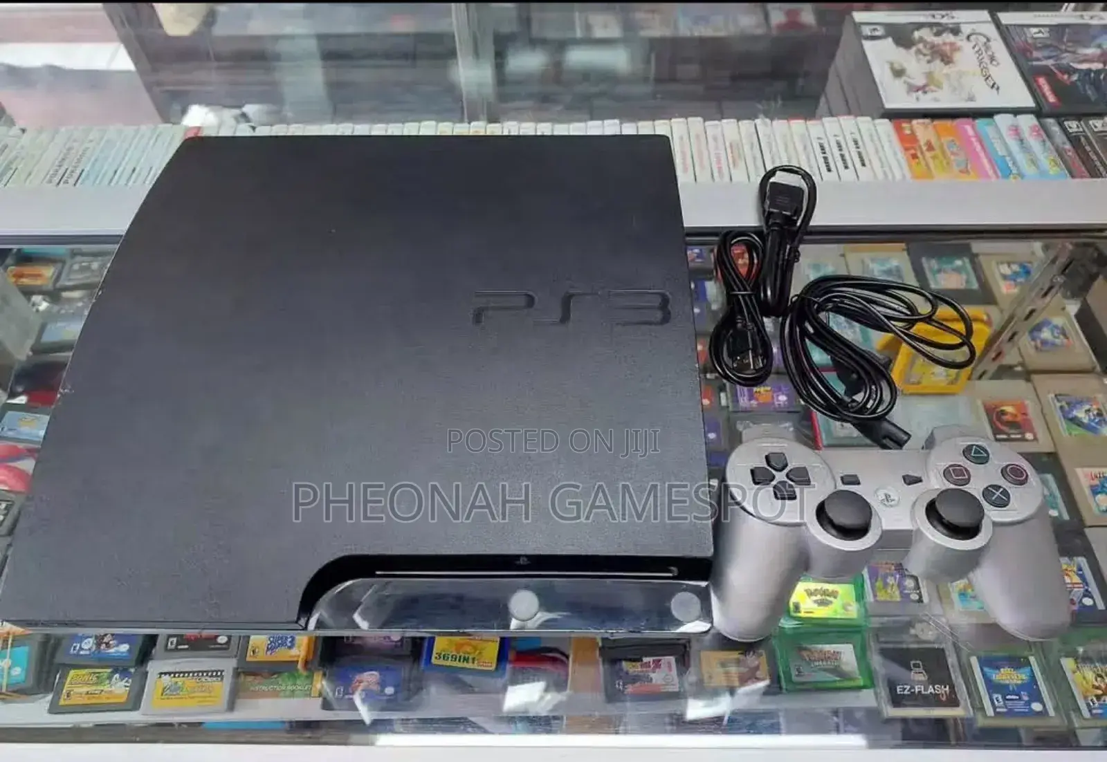 Clean Playstation 3. Ps3 Slim Comes With 13 Games and 2 Controllers