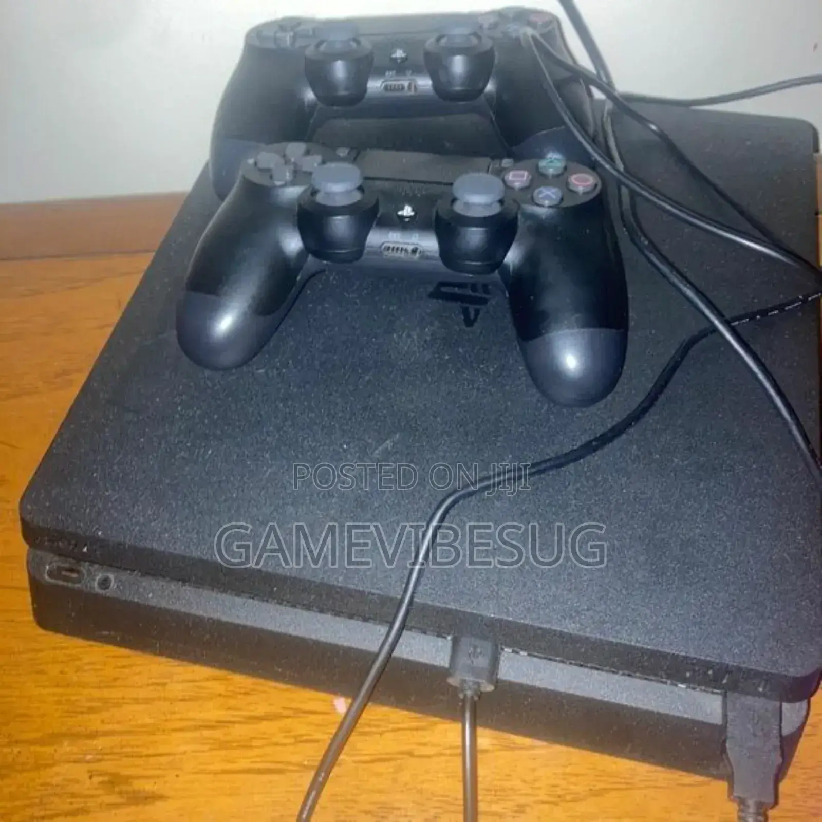 Sony Ps4 Slim Console With 2 Controllers and a 10 Game Collection