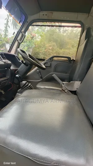Isuzu ELF Truck 2009 White