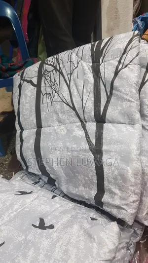 Bedcover 4 Piece. Has A Bedsheet, Two Pillow Cases And A Duve Cover