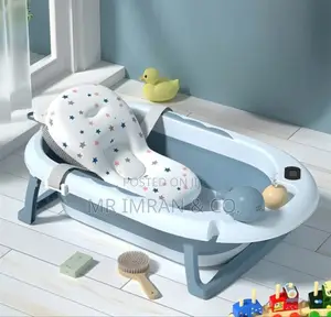 Foldable Baby Bathtub With A Temperature Sensor And A Soft Cushion.
