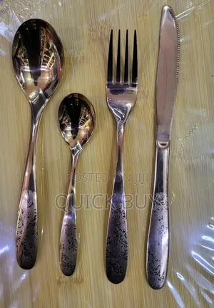 24-Piece Set of Stainless Steel Flatware With an Engraved