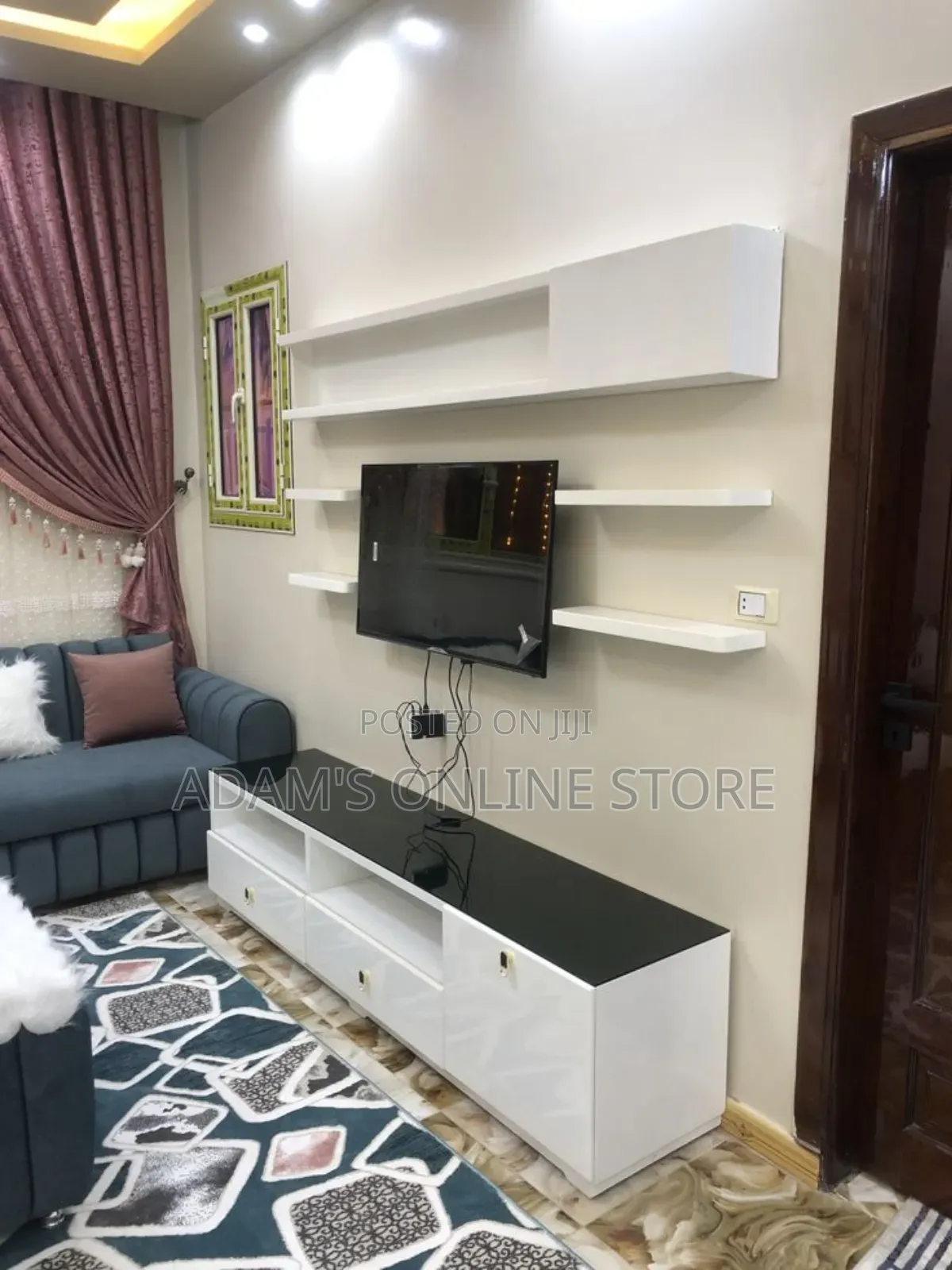 White Tv Stand Unit With Black Glass on Top
