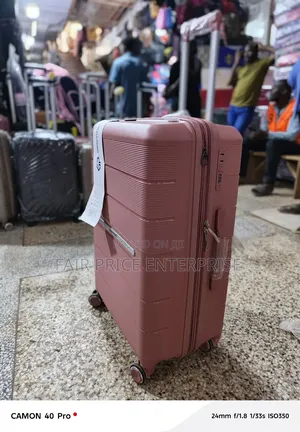 Noble Rubber Plastic Suitcase. Medium Size