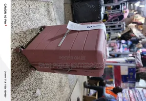 Noble Rubber Plastic Suitcase. Medium Size