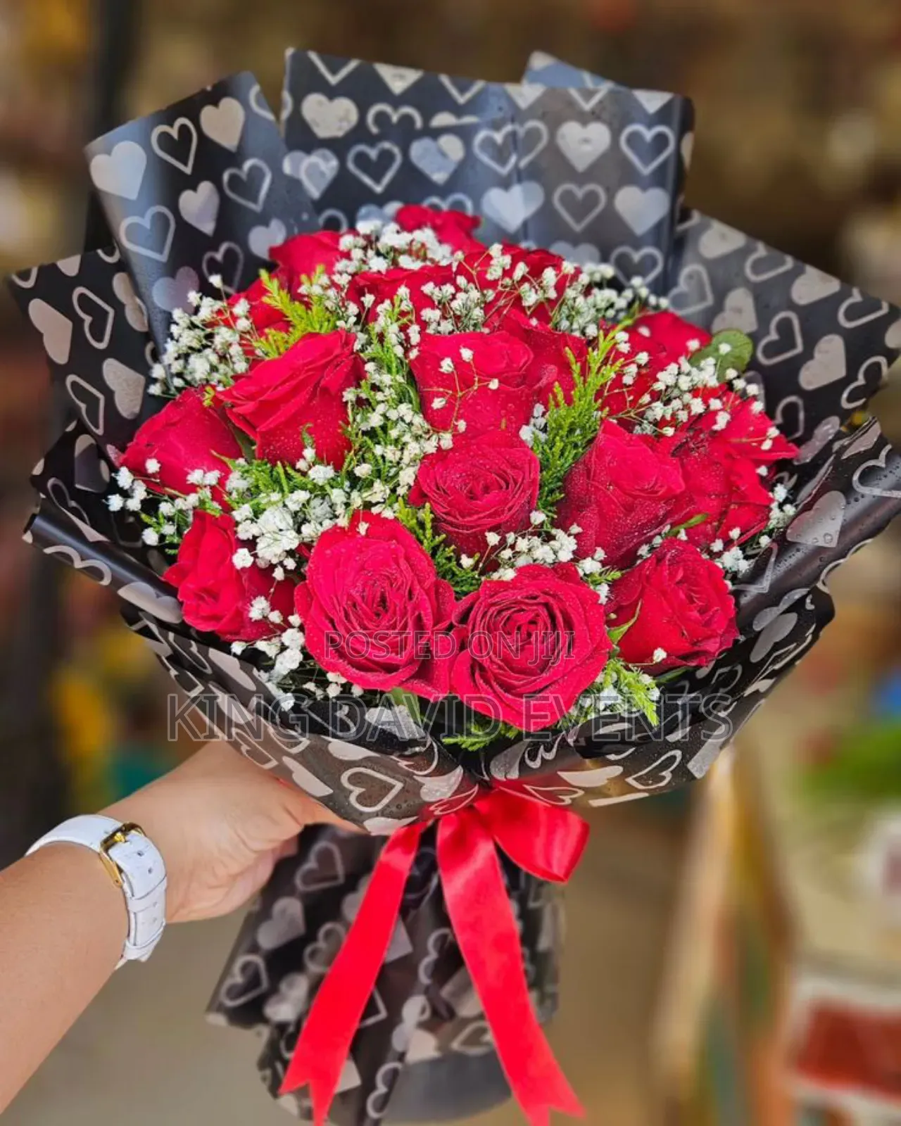 Red Flower Bouquet With Baby Breath In Kampala