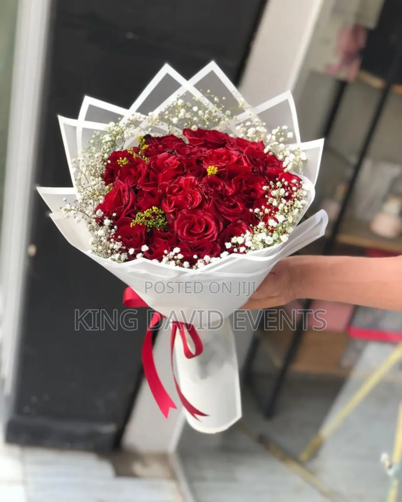 Red Flower Bouquet With Baby Breath In Kampala