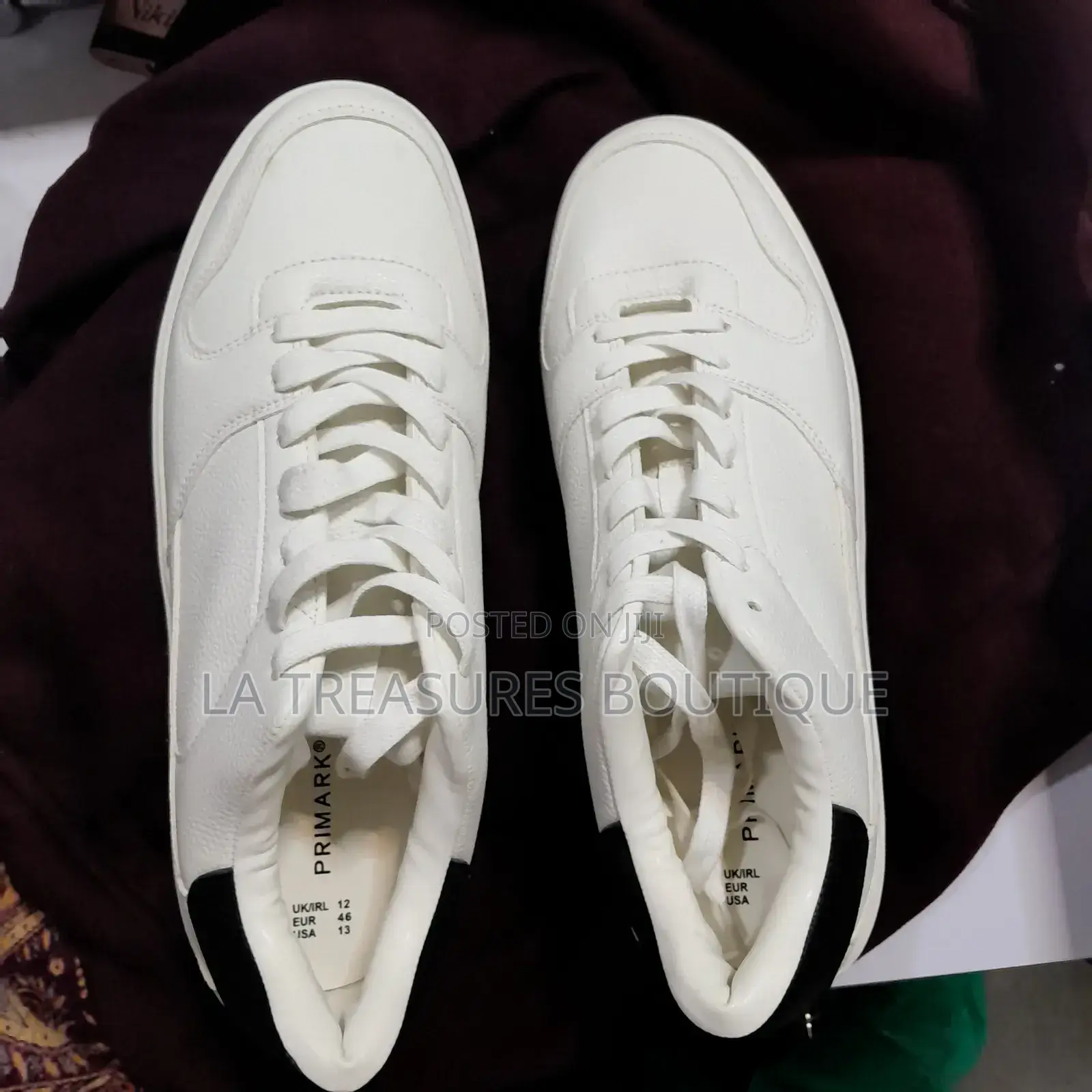 White Low Top Black Heel Sneakers.