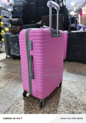 Quality Plastic Suitcase. Small Size. Pink Color