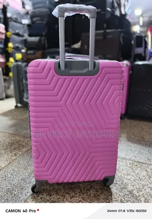 Quality Plastic Suitcase. Small Size. Pink Color