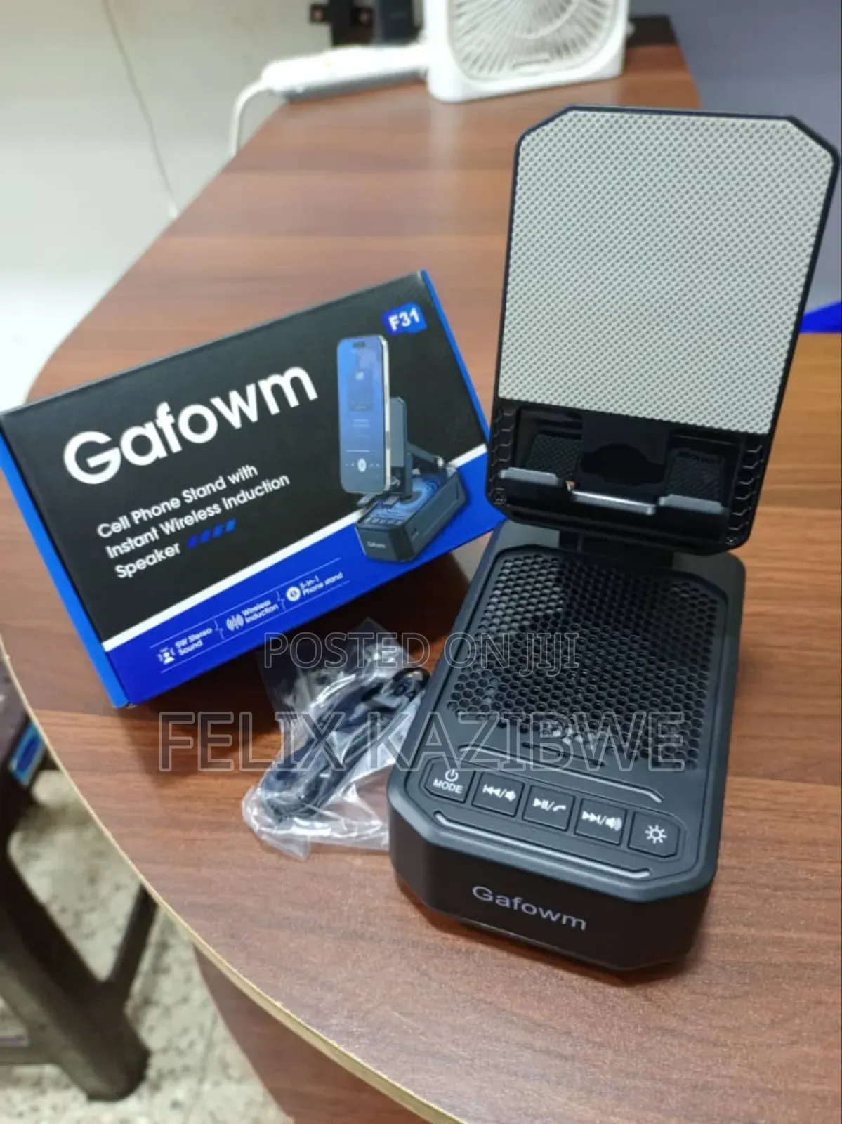 Cell Phone Stand With Instant Wireless Induction Bluetooth Speaker.