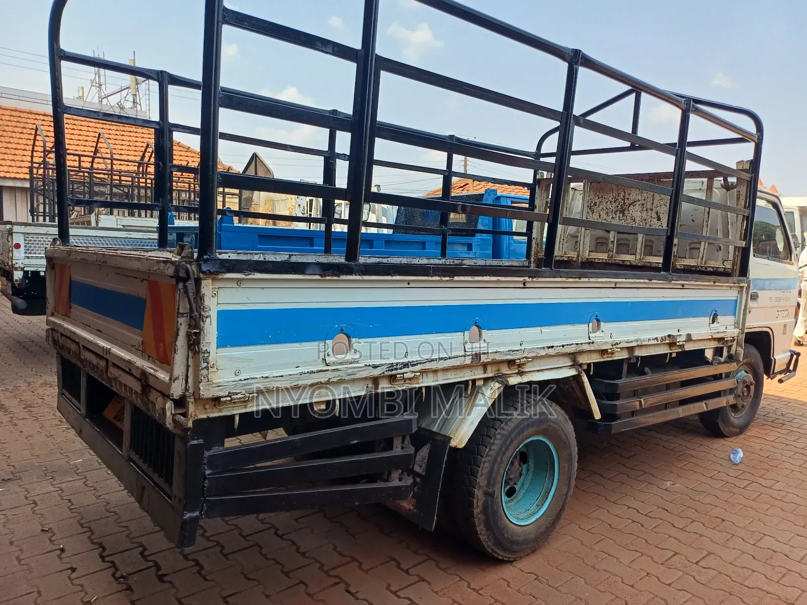 White Isuzu Truck