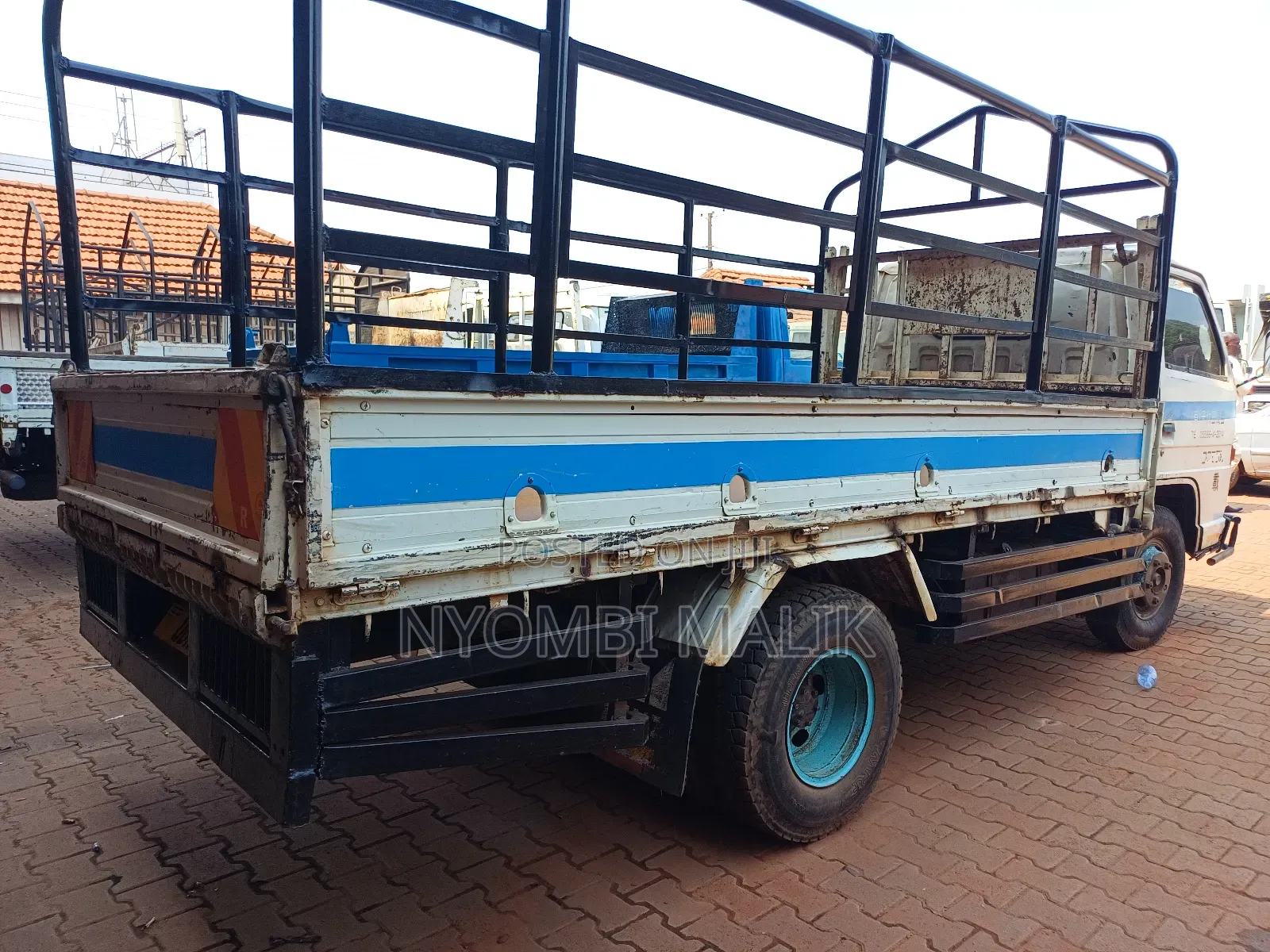 White Isuzu Truck