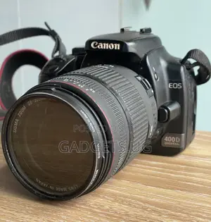 Canon Eos 400d Digital With a Sigma Lens 28-300mm