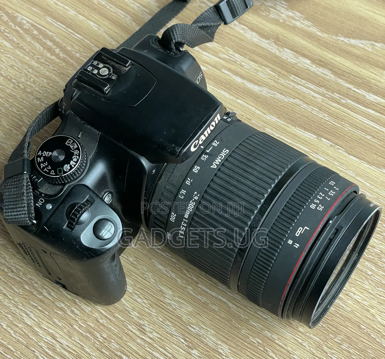 Canon Eos 400d Digital With a Sigma Lens 28-300mm