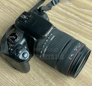 Canon Eos 400d Digital With a Sigma Lens 28-300mm