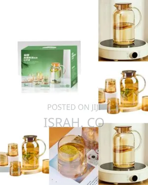 4 Cups and 1 Glass Pitcher With Handle and Strainer